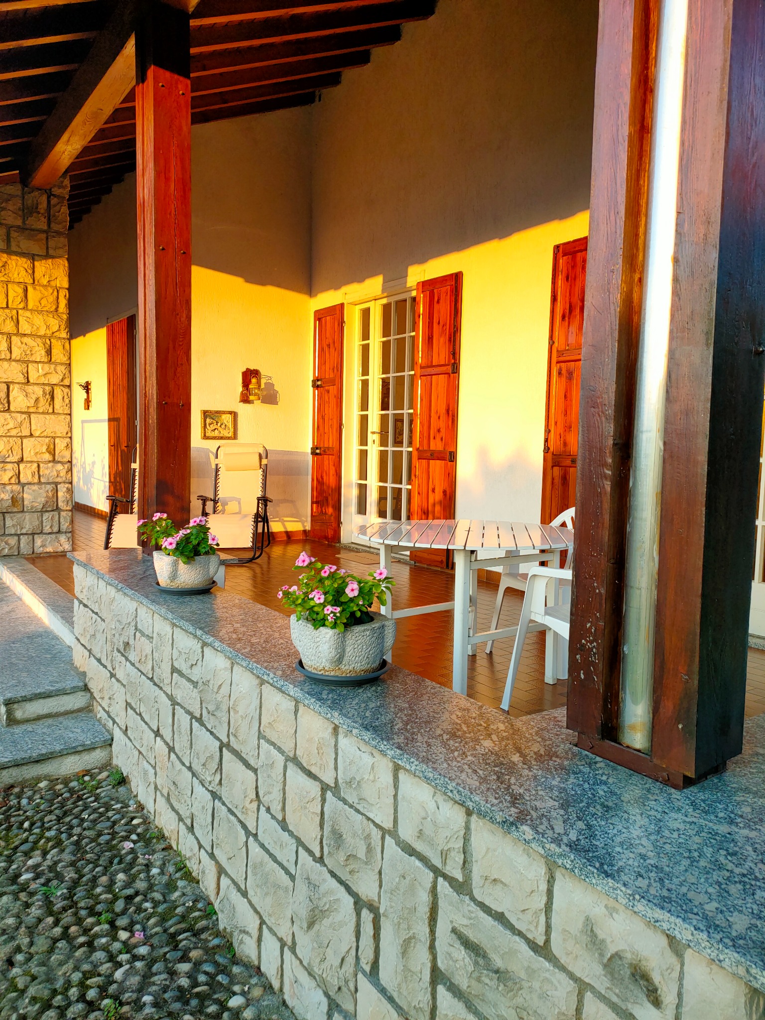 Original exterior view of Casa Luigi covered terrace